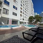 Moderna suite con balcón a pasos de la playa